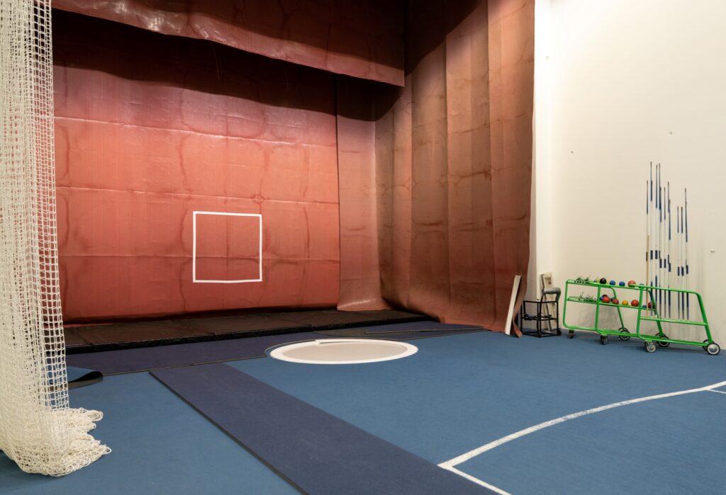 Practice area for discus, shot put, javelin, as well as golf, baseball etc.